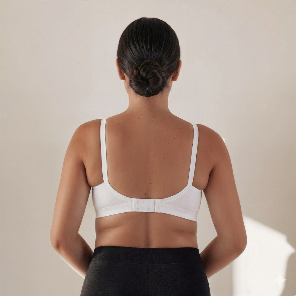 The Michal nursing bra in ivory, back view showing smooth band and hook closure