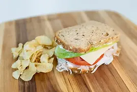 1005_PlentifulCafe_Turkey-and-Cheddar-Sandwich_21224050320384c8bd0dc1ca379f693a.webp