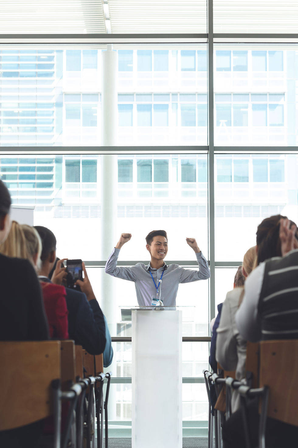 young-asian-businessman-cheering-seminar.jpg