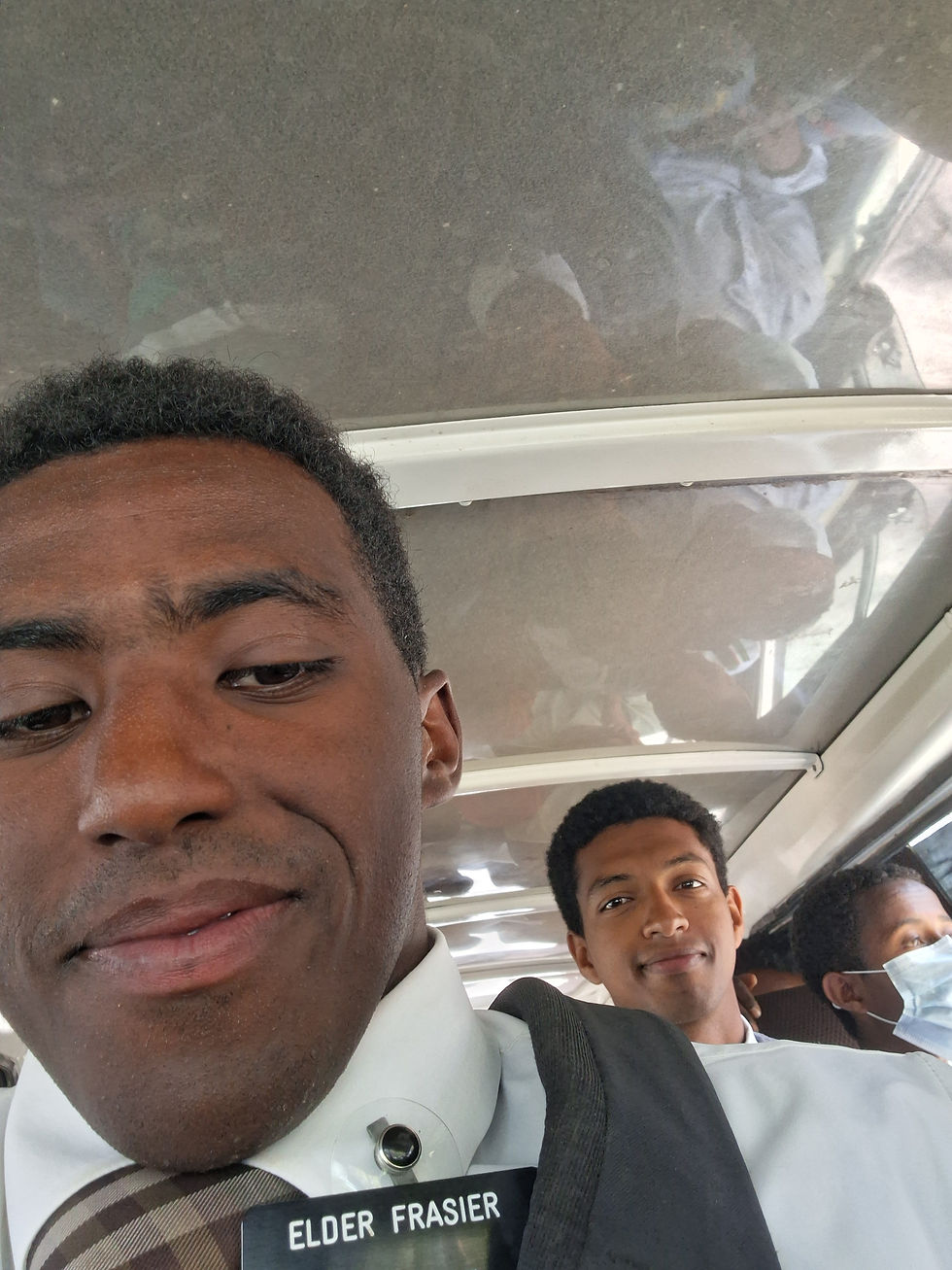 My companion and I, in a typical taxi, shared with whoever else could squeeze into the vehicle.