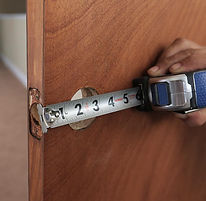 Man measuring door for prep