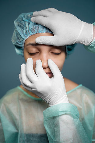 doctor-checking-patient-s-nose-before-surgery.jpg