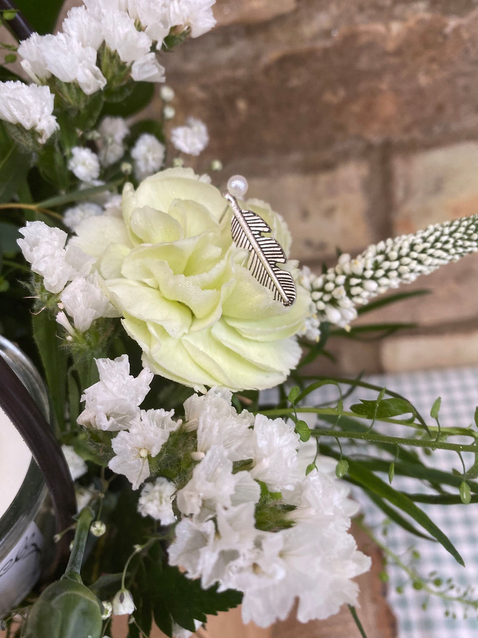 Thumbnail: Bereavement arrangement with candle