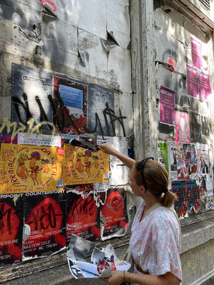 Collecting collage papers in the streets of Porto.