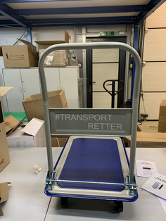 Kurierdienst Transportretter Lager Logistik Lagerwagen Kartons Kisten