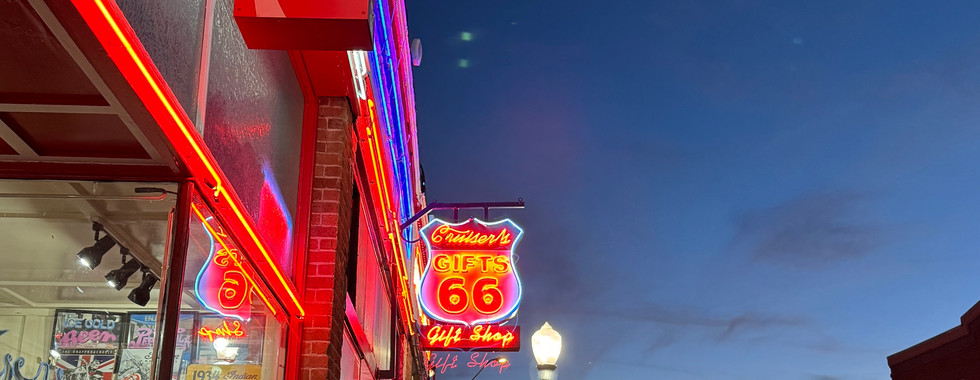 Neon signs in downtown Williams, Arizona, lit up at night