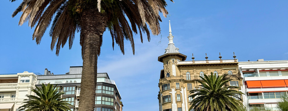 A park and nearby buildings in the City Center of San Sebastian, Spain