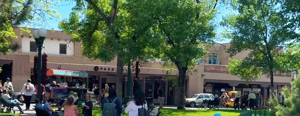 People in the downtown plaza in Santa Fe , New Mexico