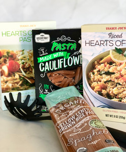 Alternatives to traditional pasta, including riced heats of palm and yellow lentil and brown rice spaghetti by Trader Joe's and cauliflower, penne-shaped pasta by Veggiecraft