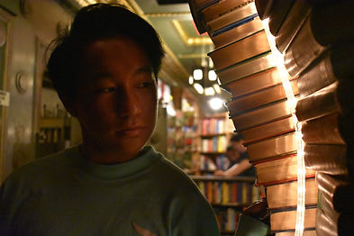 teenage boy looking at lights
