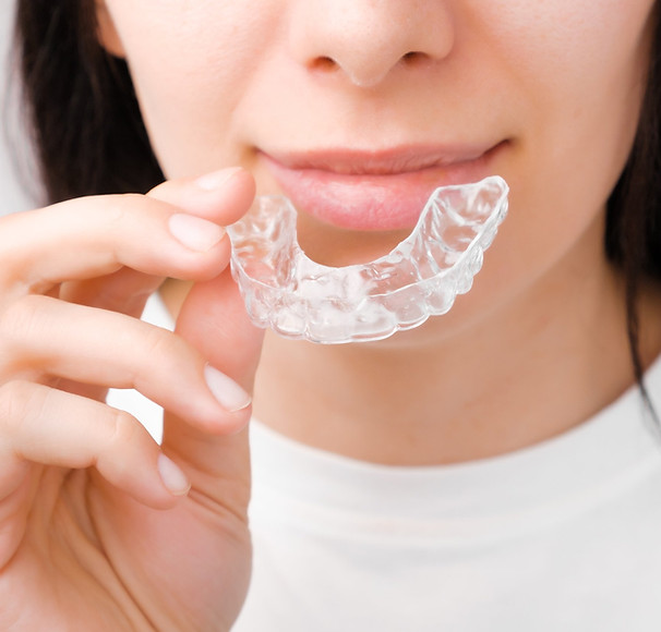 close-up-of-a-young-woman-adjusting-transparent-al-2023-11-27-05-09-38-utc.jpg