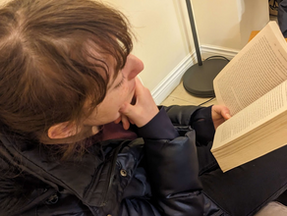 Freak student reading during reading week