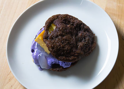 halo halo cookie with ube ice cream and leche flan in the middle.