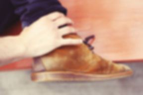 foot-brown-shoe