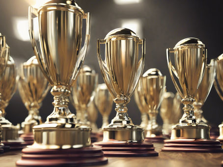 A group pf finished cups ready to be presented at an awards ceremony.