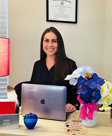 Ms. L, online math tutor at Mind Over Math Academy, smiling while teaching a virtual math lesson from her home office.