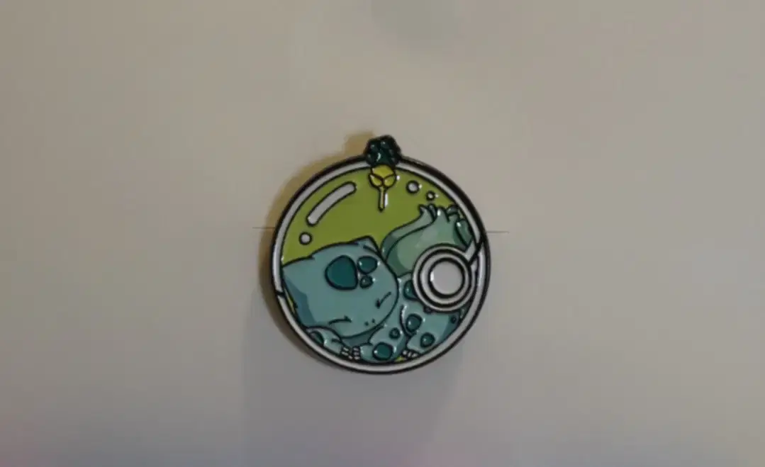 Sleeping Bulbasaur in Pokeball Pin Badge