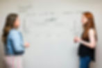 Two developers discussing the product journey