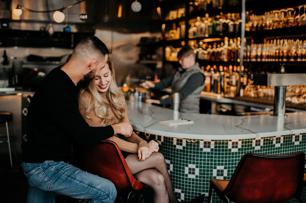 Couples engagement session at bar in Buffalo NY