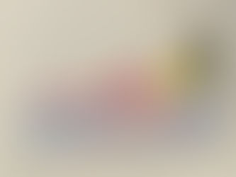 A colored pencil drawing of a nude woman with red stockings laying down looking back with her eyes closed.