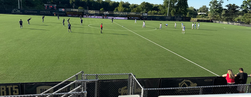 A soccer match at RavenTek Park
