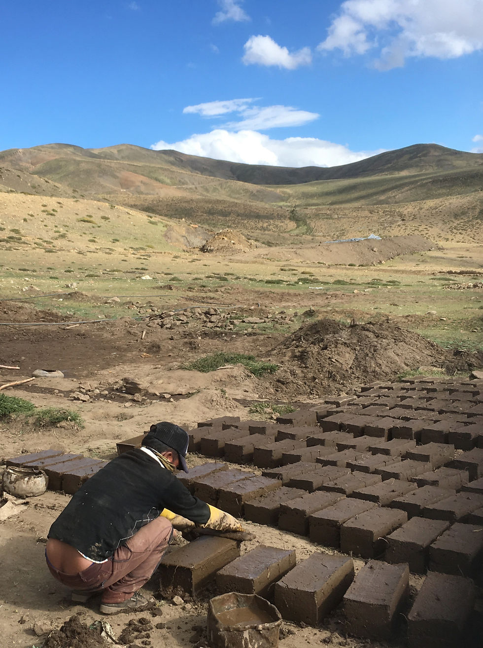 Mud bricks being prepared