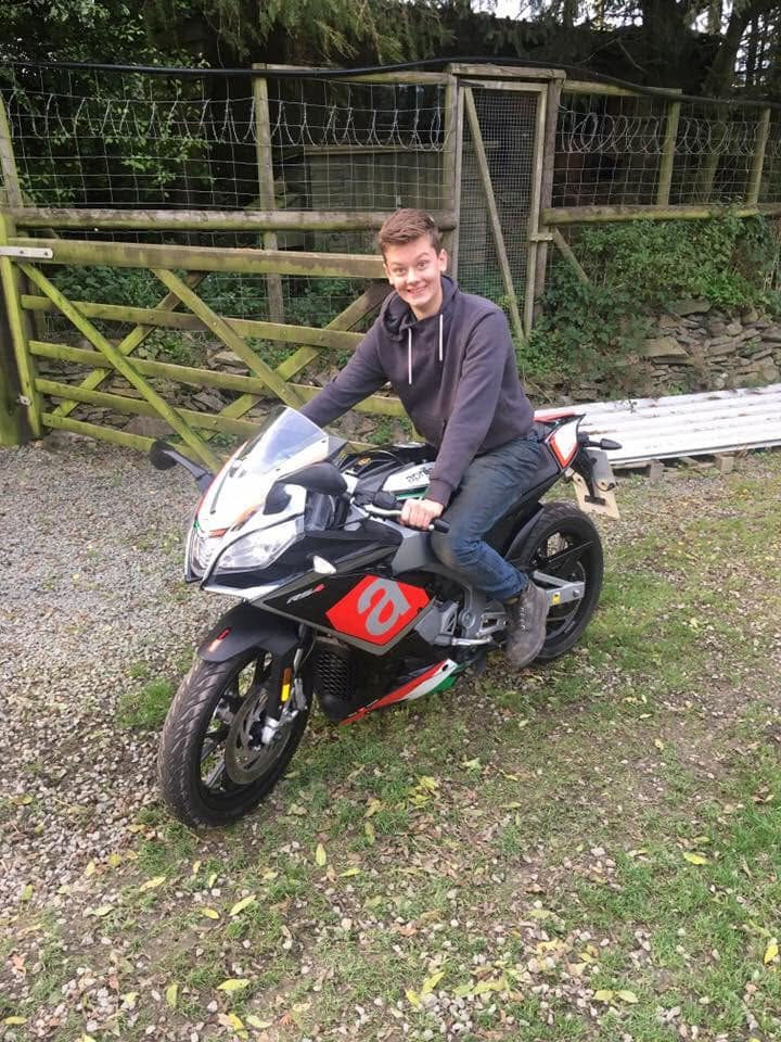 Curtis, 16 years old on the Aprillia. That grin.