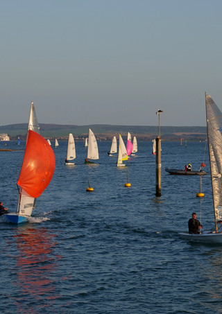 Sailing boats entering Lyminton Yacht Haven