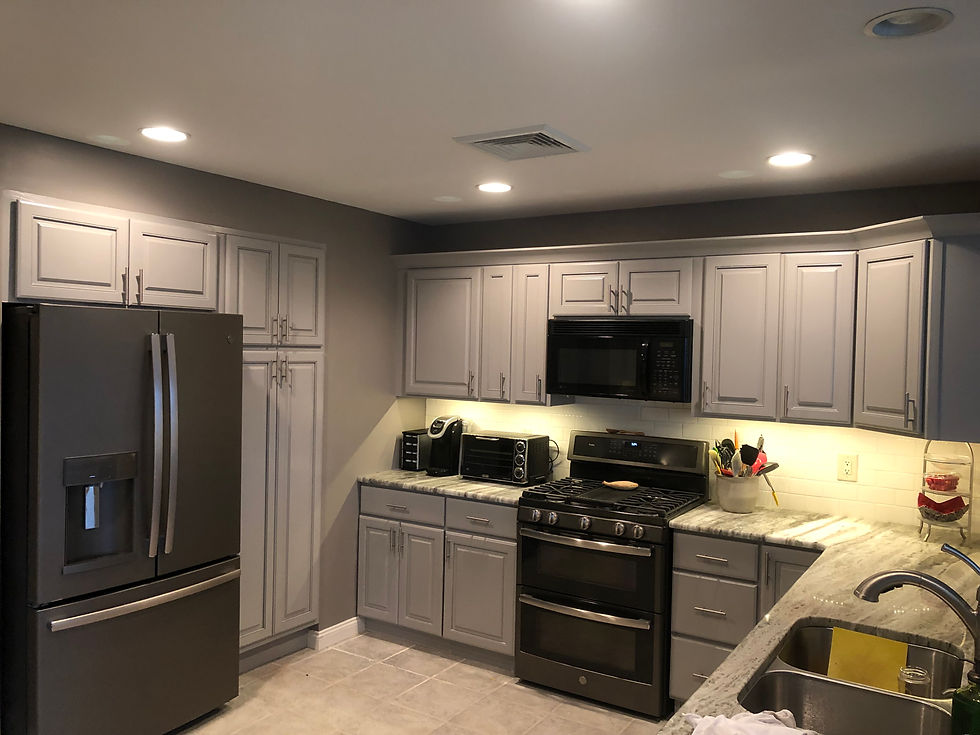 Kitchen Updated by moving and painting cabinets.