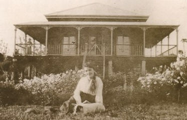 Mary in front of the Roche home