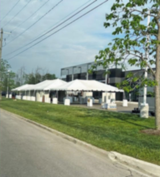 Corporate event tent, tent set up in parking lot