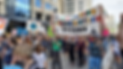 FirstU members and friends marching, with one of our FirstU banners, in the Climate March.