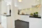 modern-kitchen-interior-with-sleek-black-counterto-2026-03-18-10-40-37-utc.webp