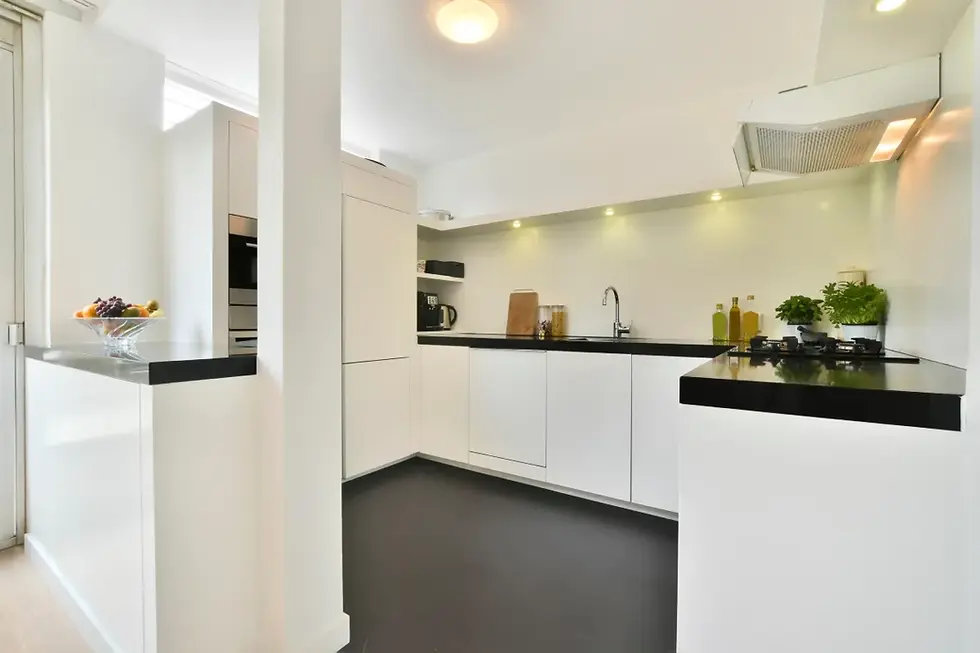 modern-kitchen-interior-with-sleek-black-counterto-2026-03-18-10-40-37-utc.webp