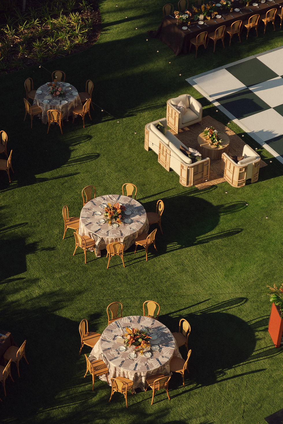 Aerial view of outdoor event tables and lounge area.