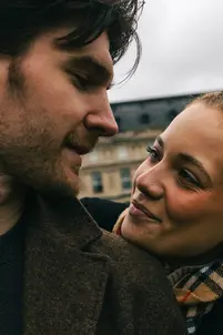 Smiling woman looking at man