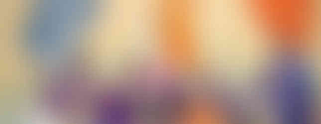 Bishop holds up a communion wafer during mass, surrounded by clergy in purple vestments. A mural with religious imagery is in the background.