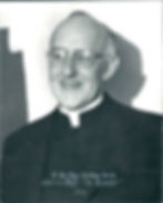 Black-and-white portrait of smiling priest in glasses; caption reads Rt. Rev. Msgr. Matthew Smith, Editor-in-Chief, The Register, 1951.