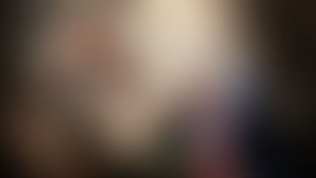 Angel delivering a message to a kneeling woman in a robe, surrounded by cherubs. A dove flies above, creating a divine atmosphere.