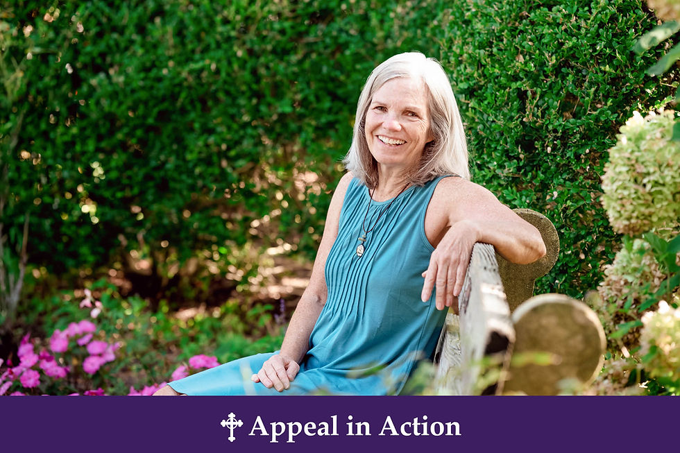 Smiling older woman in teal dress sits on a garden bench, with green hedges and pink flowers; banner reads Appeal in Action.