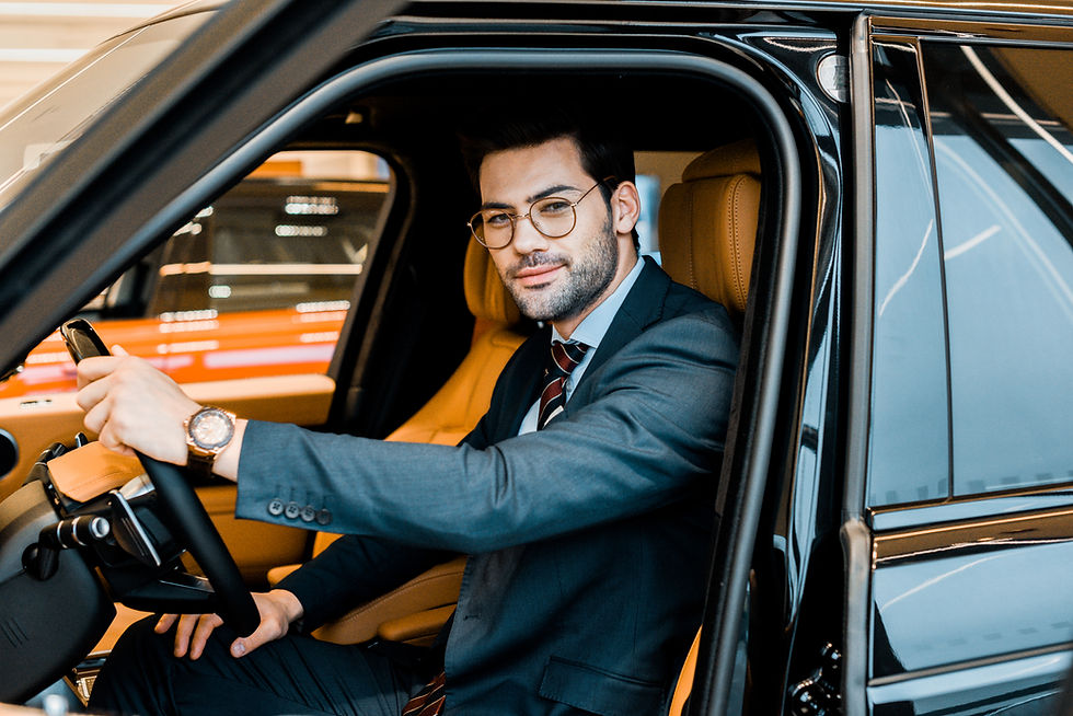 happy-stylish-businessman-in-eyeglasses-sitting-in-2024-11-08-21-37-21-utc.jpg