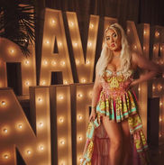 Giant illuminated HAVANA marquee letters at an indoor event
