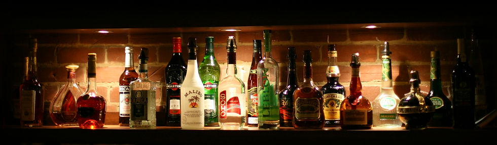 awesome-alcoholic-beverages-on-bar-shelves-background-header.jpg