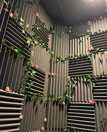 Many layers of acoustic foam covering the inside of a vocal booth