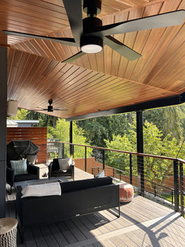 Outdoor patio with red grandis auburn wood planks