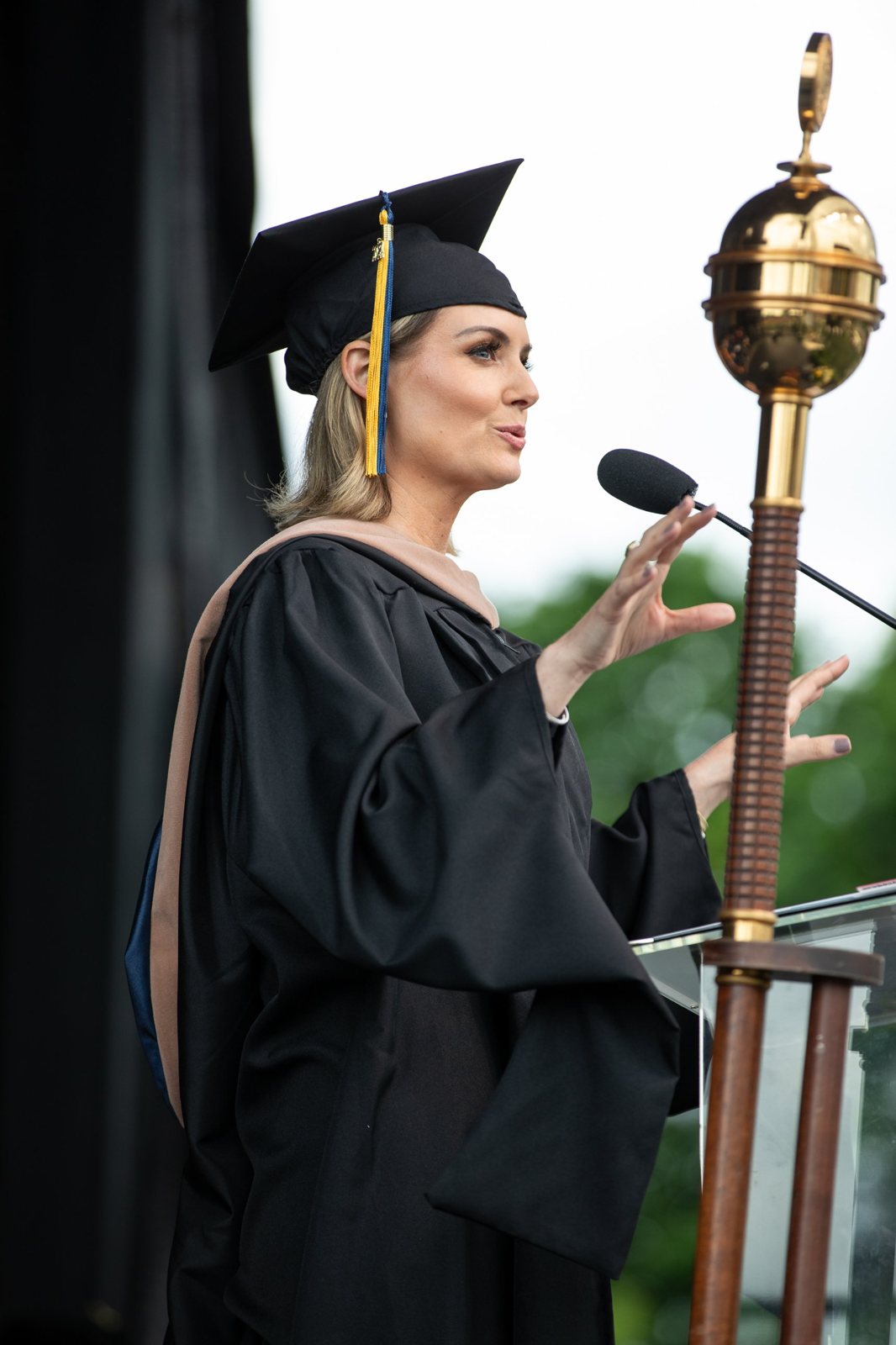 Jillian delivering the La Salle University commencement address at the podium