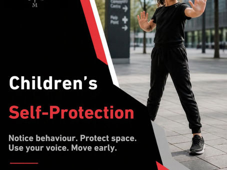 Girl in black stands in a self-defense pose beside a poster reading Children’s Self-Protection, Read the Blog.