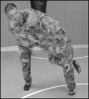 Usage of a leg trip to perform a takedown.