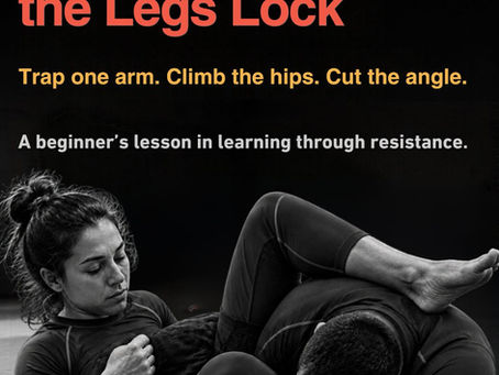 Black-and-white submission grappling lesson: woman traps a man in guard under text The Triangle Starts Before the Legs Lock.