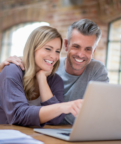 adults on laptop